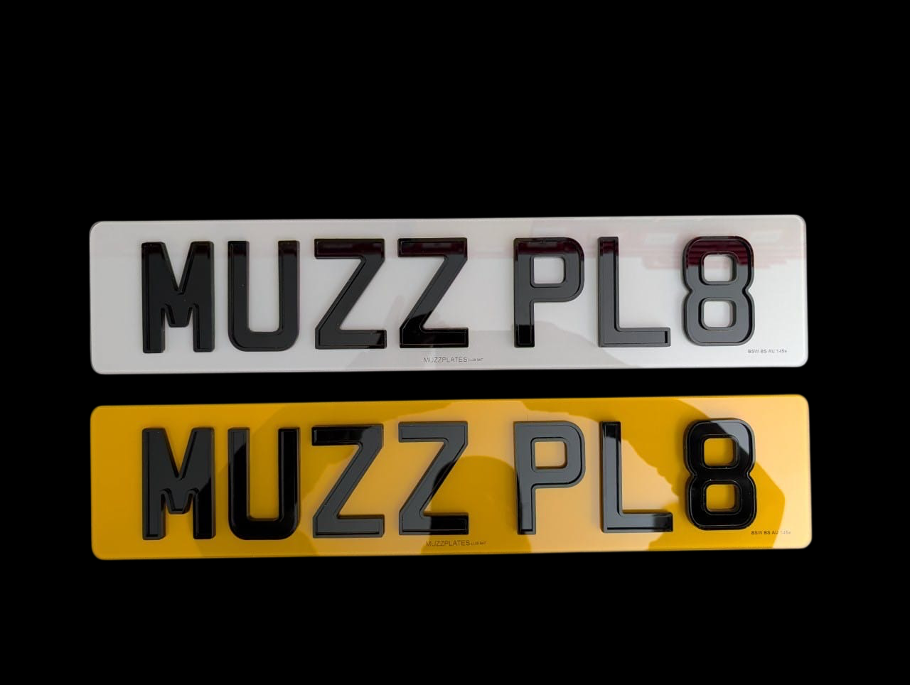 Two face on ghost number plates with 'MUZZPLATES' branding on a black background